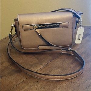 Blush crossbody bag with gold zipper